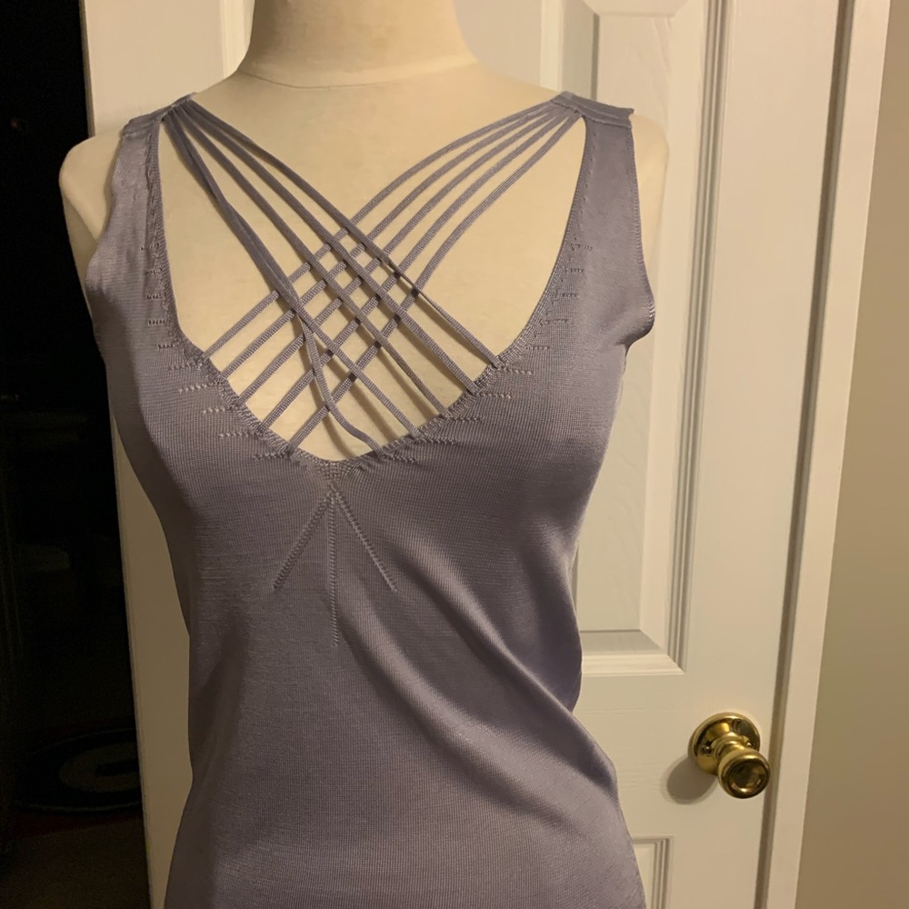 This Strappy Kenneth Cole cami is very light weight & can be worn by itself